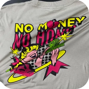 T-shirt with a DTF design being stretched to demonstrate the print's flexibility and durability