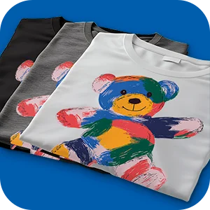 Three t-shirts with a colorful bear DTF design, showcasing textile customization options.